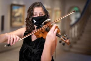Picture Of Kate Hatmaker, Art Of Elan Executive And Artistic Director, Performing On Violin In The San Diego Museum Of Art Rotunda Photo by Gary Payne